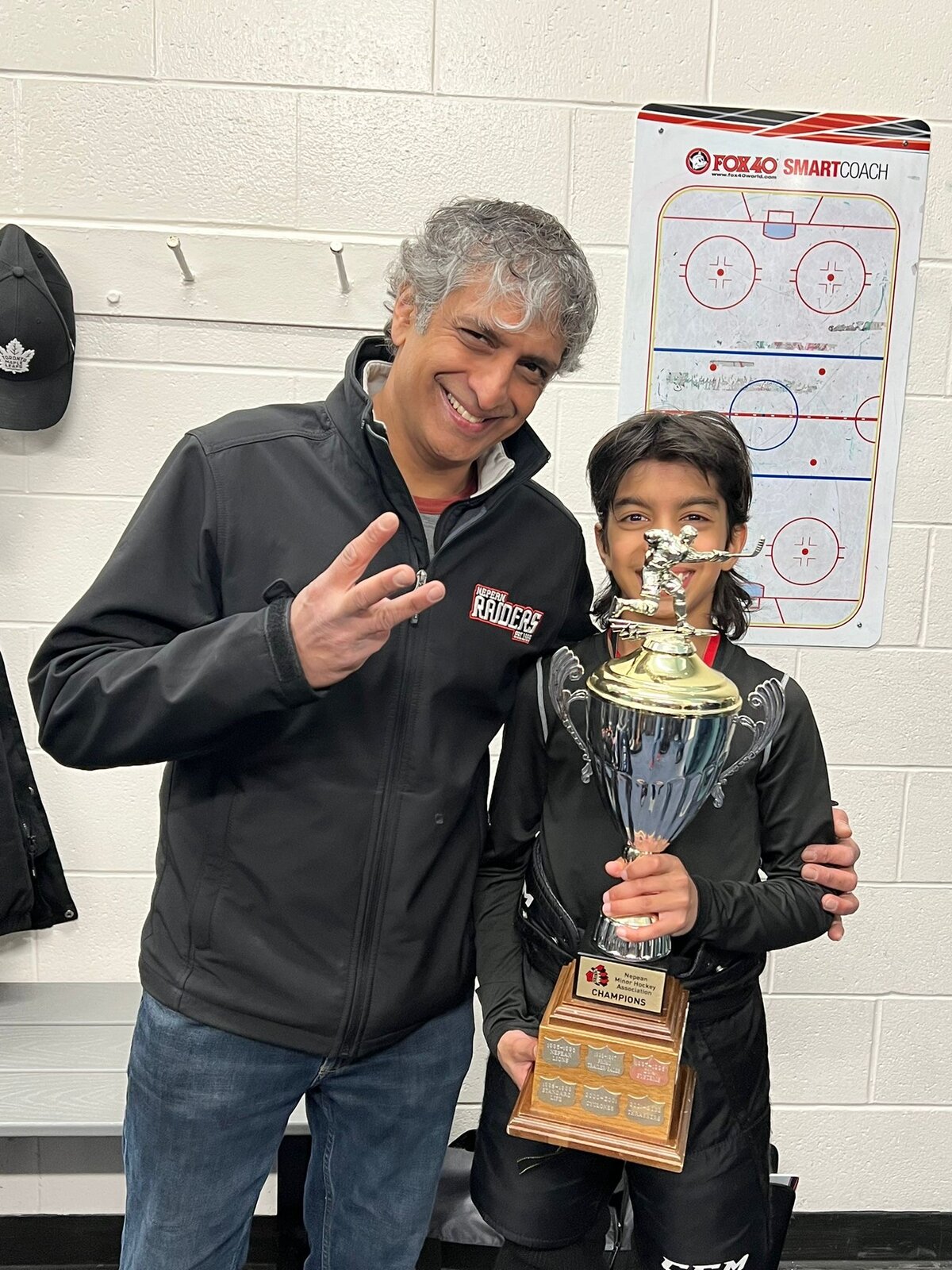 Shamil Radia at a hockey game — Ottawa Senators fan